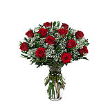 One dozen long stem red roses arranged in a glass vase with baby's breath. This Canada Flowers rose arrangement is simply stunning, like no other online.