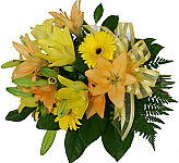 Hand tied bouquet of yellow and orange lilies with yellow gerbera, mixed greens and matching bow.