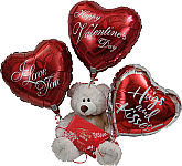 This Valentine's give her a plush teddy bear with a box of assorted chocolates and three romantic, lovethemed balloons. She'll love the overthetop combination!