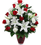 Send our uncompromising True Beauty Bouquet to celebrate a special love. Featuring one dozen red roses, white lilies and white carnations. Available across Canada.