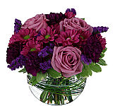 A harmonious floral design combining beautiful pink, purple, lavender and fuchsia blooms.