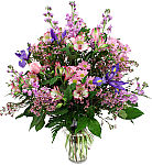 Beautiful Pinks is a Canada Flowers Original design featuring assorted pink and purple flowers arranged in a clear glass vase for Anniversaries.