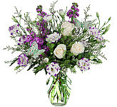 An elegant and sophisticated design of purple and cream flowers with delicate greenery for anniversaries. Same day Canada delivery.