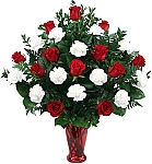 Our Everlasting Love arrangement is a beautiful gift of one dozen red roses plus one dozen white carnations.