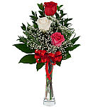 Simple, elegant and expressive bud vase of three mixed colour long stem roses for an anniversary.