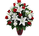Send True Beauty to celebrate a special anniversary. This is an uncompromising flower arrangement of red roses, white lilies and white carnations. Available across Canada.