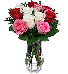 Send your love this anniversary with a beautiful vase arrangement of one dozen long stemmed mixed colour roses · including red, pink and white.