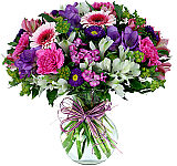Pretty clear vase of pink and purple shades. Perfect to send for any occasion.