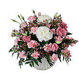 Pretty rounded arrangement in pink and white, made with carnations, miniature carnations, lisianthus and delicate pink waxflower. What a nice way to say Happy Birthday. We are Canada Flowers, Canada's National Florist.