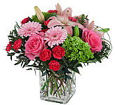 A pretty combination of pink lilies, roses, mini Gerbera and hydrangea for birthday gift giving across Canada.