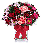 Help Canada Flowers support the Canadian Foundation for Women's Health with this gorgeous red and pink vase arrangement, suitable for gift giving on a budget across Canada.