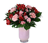 Our stunning Valentine’s bouquet of passionate pinks and red is expertly arranged inside a pink glass vase for the perfect finishing touch. It’s a romantic surprise that speaks volumes about the love you feel.