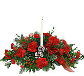 A Canadian Christmas is a Canada Flowers Original of all red flowers and a taper candle to celebrate a Canadian Christmas.