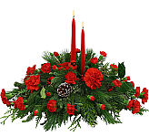 Send our beautiful Christmas centerpiece that is a balance of Christmas red and green done just right. Trust Canada Flowers with your floral holiday gifts.