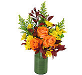Fall flower arrangement featuring variegated orange roses with yellow spray roses and much more. Same day delivery in Canada.