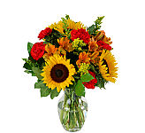 Sunflowers, alstroemeria, carnations, solidago and statice combine to create a beautiful tapestry of colour.