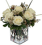 Express your joy and happiness at the arrival of a new baby with our Canada Flowers Inocence arrangement of white roses.