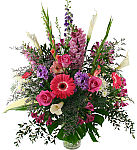 Opulent mix of extravagant fresh blooms create an uncompromising floral gift. Premium flowers online by Canada Flowers.