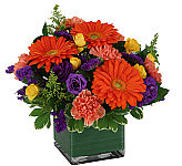 Leaf lined cube vase with sunflowers, lilies, and more for the Summer.