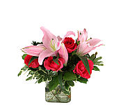 Send her a beautiful bouquet of one dozen premium long stemmed red roses. Same day delivery across Canada.
