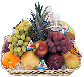 Christmas fruit and cheese basket. Featuring a tasty combination of seasonal fresh fruit as well as some cheeses and bottles of spring water or mineral water. A refreshing, healthy gift that will surely be enjoyed.