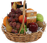 This handled wicker basket features assorted fresh fruit, plus an added selection of teas and cookies. A perfect combination at anytime or any place during the Christmas holidays.