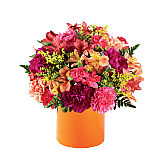 Pink glass vase flower arrangement of orange, fuchsia and hot pink blooms. Available same day to most cities across Canada.