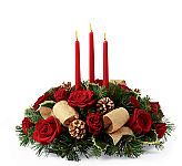 The FTD® Celebration of the Season Centerpiece is a display of holiday elegance perfect for gift giving or decorating in your own home.