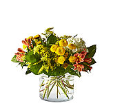 This radiant bouquet is designed with a dreamy mix of peach, yellow, and light green blooms to create the perfect impression. Whether it's sent as a pick-me-up, a celebration, or just to make someone smile, everything is just peachy once this arrangement arrives. 