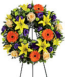 The beautiful FTD® Radiant Remembrance™ Wreath a wonderful representation of a life well lived.