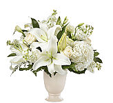 A stunning bouquet is a thoughtful way to send your condolences during difficult times. Our local florists handcraft each lily, hydrangea and lisianthus in the Remembrance Bouquet to share your sympathy. While the lilies may initially arrive in bud form, they transform into bursting flowers as they open.