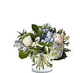 Let this uplifting arrangement be a reminder of the clear skies ahead. Reminiscent of the hope that a new day brings, this bouquet is composed of voluminous hydrangea blooms and vibrant belladonna delphinium to refresh their mood. 