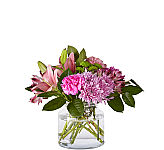 Give FTD's popular and affordable Blooming Bounty Bouquet with Canada Flowers, Canada's National Florist. Handled basket featuring purple, pink, white and green blooms. Same day delivery across Canada.