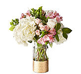 Give the gift of freshness with a vase full of Rosé All Day. This blush beauty brings elegant excitement to end tables and entryways alike with its selection of roses, hydrangea, spray roses, and more. 