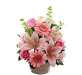 This fresh, pink bouquet makes a perfect tribute to honour a special someone who, friends, colleagues and family remember as simply sweet .