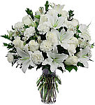 White Light Bouquet is a beautiful floral design of all white flowers, suitable for a funeral home or mortuary.