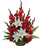 Remembrance is a Canada Flowers Original funeral design made with red and white flowers. A popular, very affordable gift for delivery across Canada.