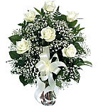 Vase arrangement of six white roses with baby's breath and white ribbon. Affordable and tasteful funeral flowers by Canada Flowers, Canada's National Florist.