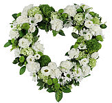Express heartfelt thoughts of sympathy in a special way with this open heart standing wreath made of carnations, roses, gerbera daisies, lisianthus and more