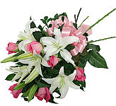 Pretty bouquet of one half dozen pink roses with lovely white lilies. Available same day across Canada.