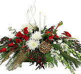 Luxury Christmas flower centerpiece by Canada Flowers, featuring roses, orchids, candles, golden leaves, hpericum berries and more