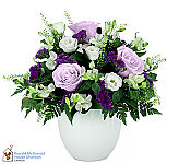 Charming flower basket featuring white, pink and purple flowers. A perfect get well gift basket for delivery across Canada.