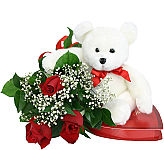 Send a three part gift of flowers, chocolates and a cuddly teddy bear to show her how romantic you really are.