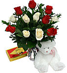 Deluxe combination of one dozen roses with assorted chocolates and plush teddy bear