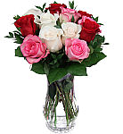 Send your loving wishes with this beautiful vase arrangement of one dozen of the very best pink, red and white roses.