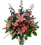 Heartfelt sympathy arrangement for the family residence from Canada Flowers at CanadaFlowers.CA.