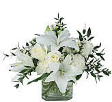 Send this precious sympathy arrangement to the family residence. Beautiful flowers from Canada Flowers at CanadaFlowers.CA.