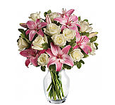 Teleflora's Always a Lady vase arranged stunning lilies and roses.