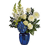 Teleflora's Ocean Devotion brilliant blue and white bouquet perfect for anytime.