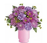 A budget friendly pink vase is arranged with lovely pink, purple and lavender blooms, perfect for Get Well gift giving. Delivered across Canada.